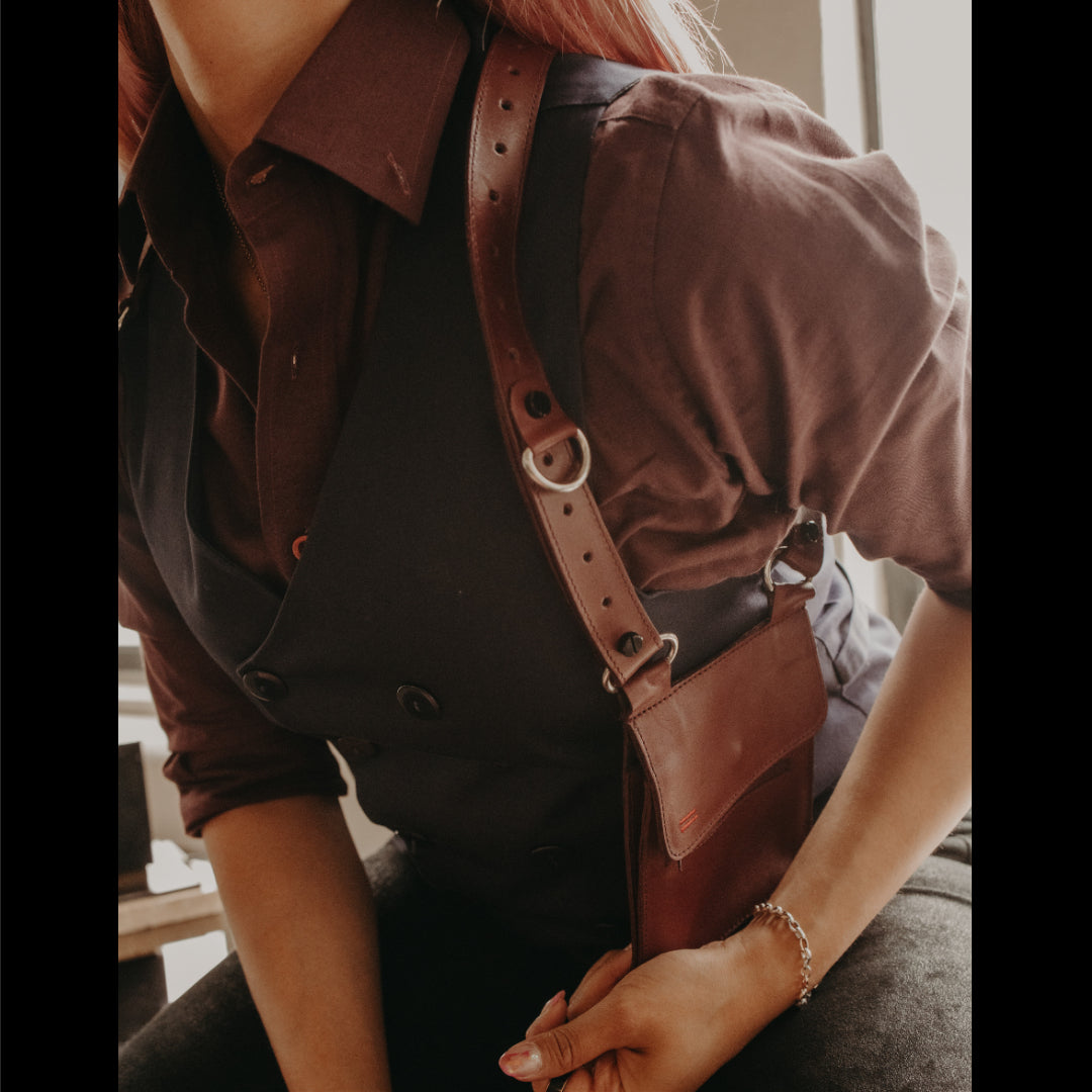 Model wearing our crimson Utility Holster Harness looks great in any occasion.