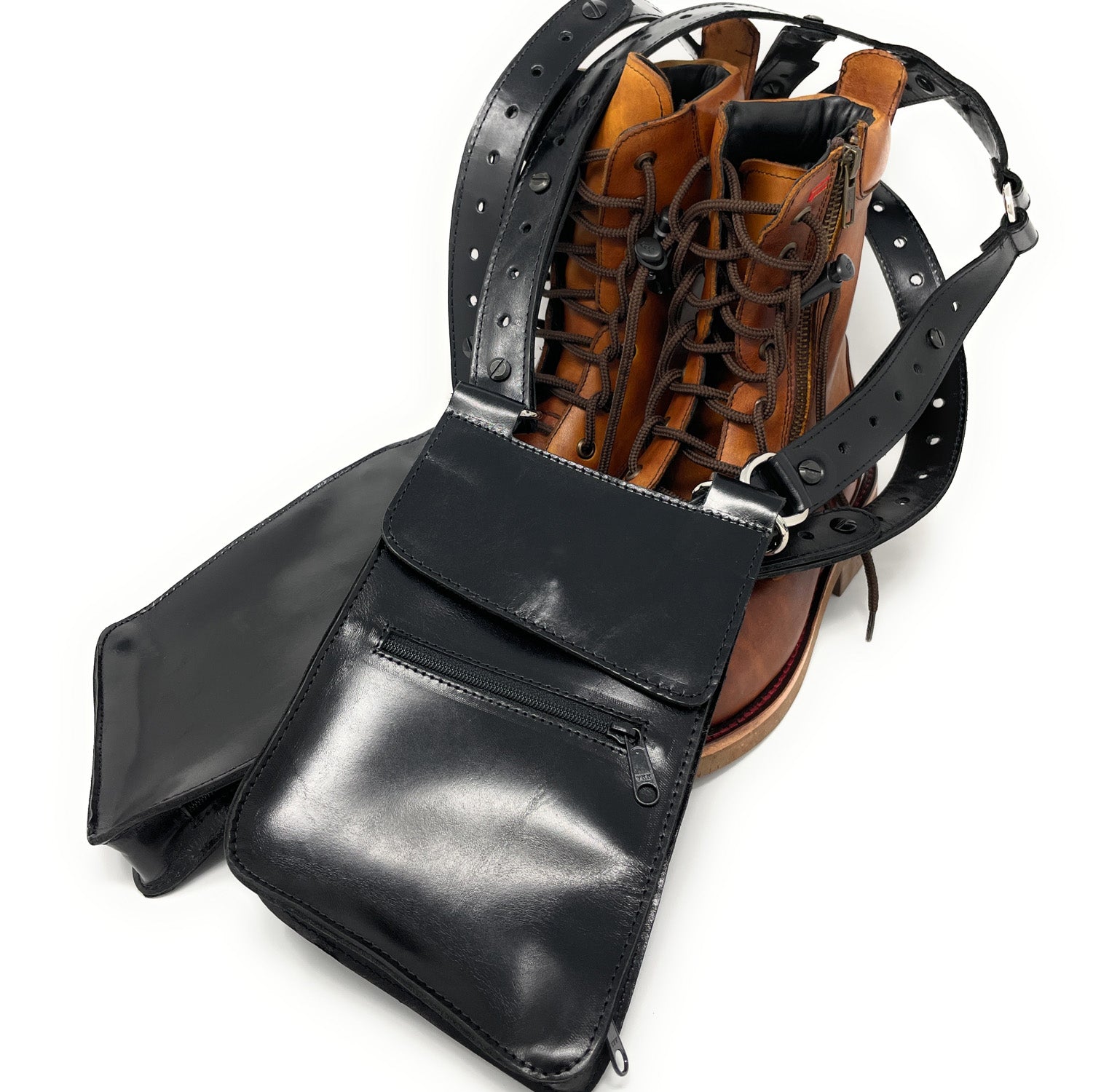 Close-up of the bag compartment on NiK Kacy Holster Harness 2.0, showcasing the secure zipper closures and premium leather craftsmanship.