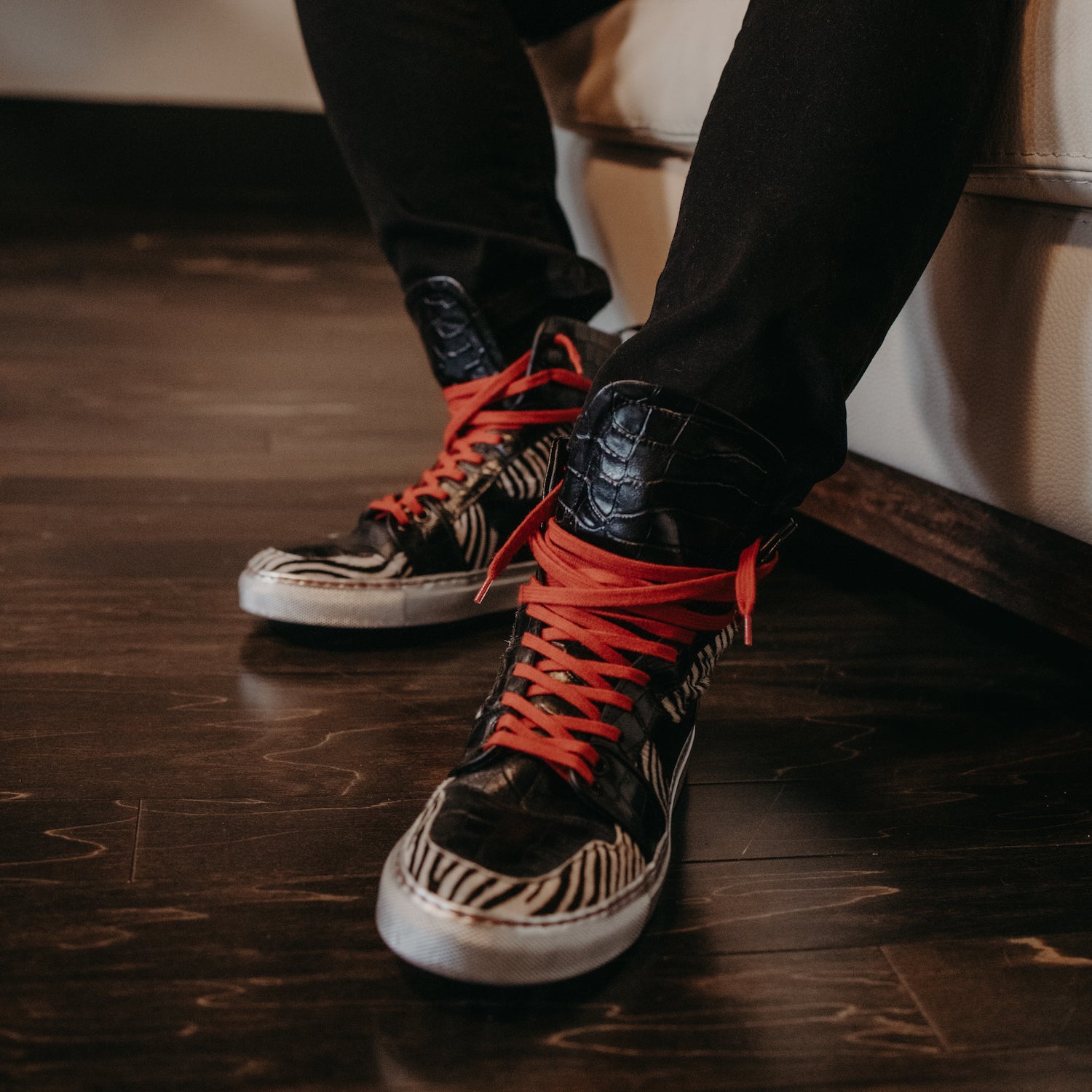 Model wearing NiK Kacy High-Top Sneakers, exemplifying the blend of fashion and comfort in everyday settings.